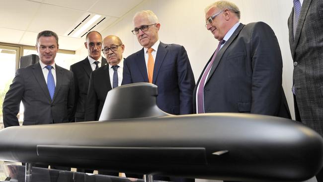 Conned: then prime minister Malcolm Turnbull with French defence officials in 2016. Picture: AAP