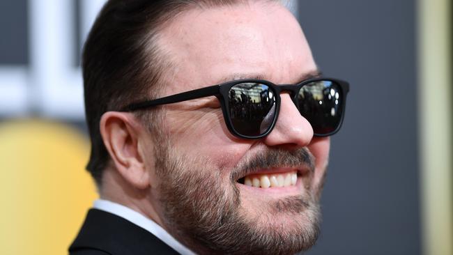 (FILES) In this file photo taken on January 5, 2020 British host Ricky Gervais arrives for the 77th annual Golden Globe Awards at The Beverly Hilton hotel in Beverly Hills, California. - From glitzy all-vegan galas to recycled red carpet outfits, Hollywood has stepped up efforts to reduce its carbon footprint this awards season, which will soon wrap up with the Oscars. But while some scientists have welcomed A-listers' renewed zeal on climate change, others have questioned whether Tinseltown's jet-set elite are any sort of example to follow. (Photo by VALERIE MACON / AFP)