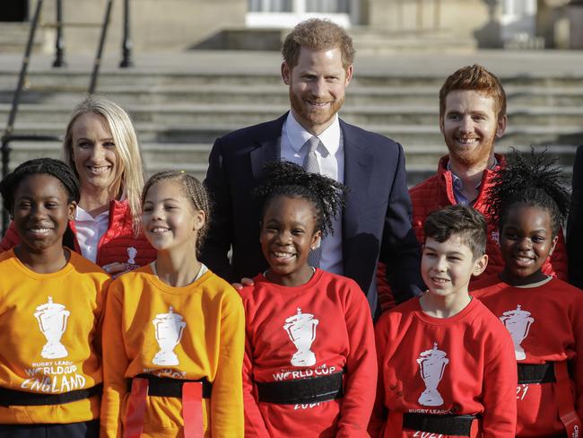 These kids couldn’t stop smiling either. Picture: AP