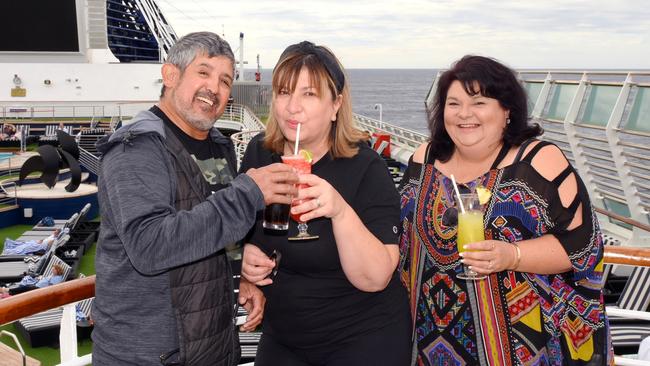 Riverland residents Carlos and Maria Rivera and Sue Yabsley aboard the Pacific Explorer.