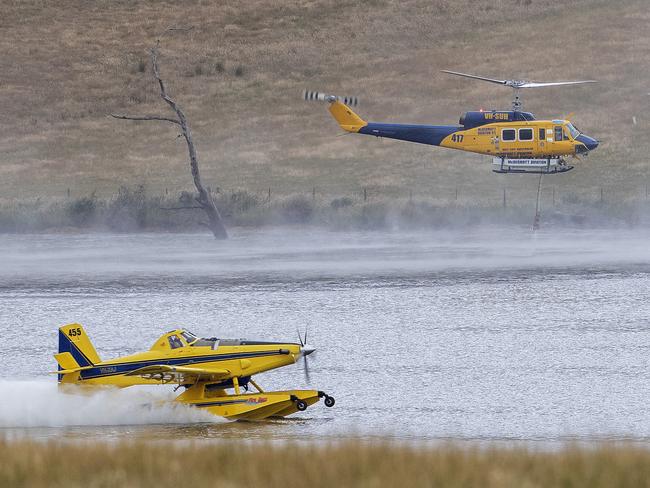 Aviation firefighting fleet demonstration at Colebrook, Air Tractor Fire Boss and a Bell 214B. Picture: Chris Kidd