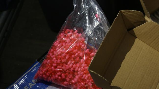 A bag of MDMA caps was found stashed in a Botany storage unit. Picture: NSW Police