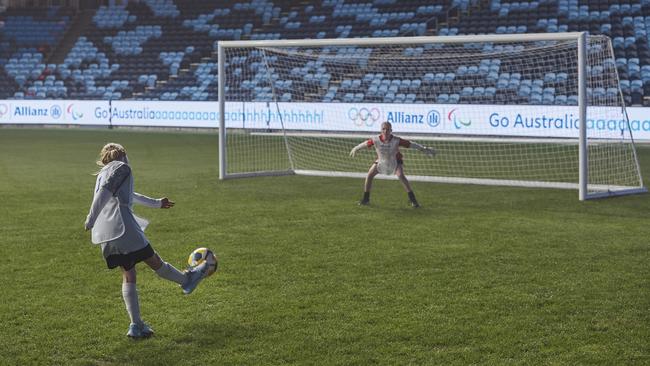 Mid-fielder Ashleigh, 12, from Football St George takes aim at goal. Picture: Supplied