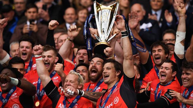 Saracens lift the trophy following their 28-17 victory in the European Rugby Champions Cup final.