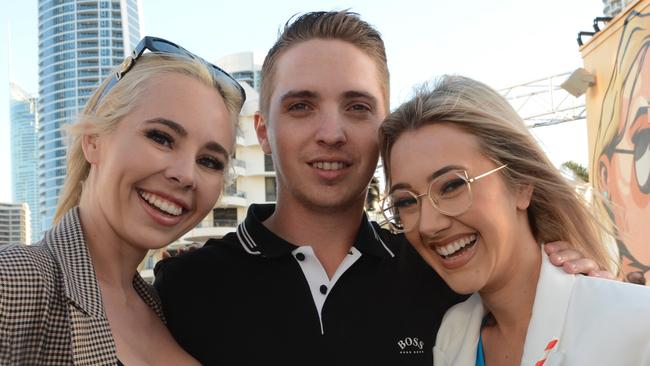 Brooke McNaughton, Mitchell Rolfe and Ashleigh Phelan at the opening of Cali Beach Club, Surfers Paradise. Picture: Regina King (copyright restrictions apply 07 55322193). "FEES APPLY, ONE TIME USE, NO ON-SELL OR ON-PASS". Pic for The Inside Word Peter and Regina Column GC Bulletin ONE TIME USE ONLY. Please call for permission to use.