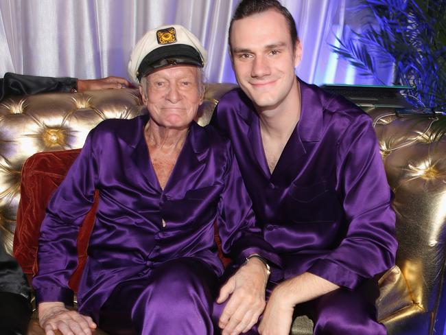 Playboy magazine founder Hugh Hefner and son Cooper Hefner in 2014. Picture: Getty