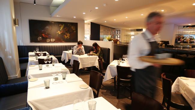 Ezard dining room is handsome, stylish and dimly lit at night Picture Rebecca Michael.