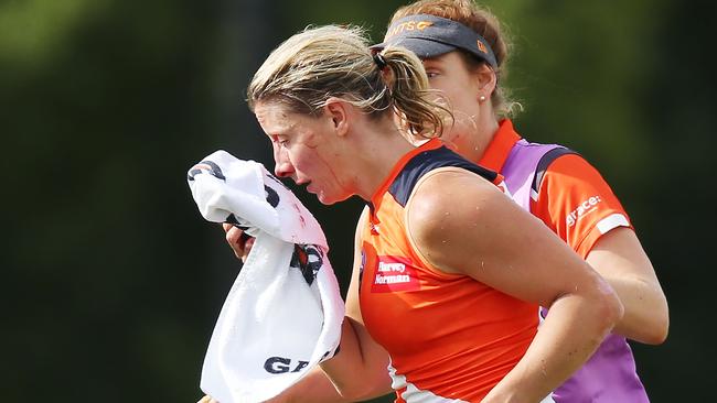 GWS’ Cora Staunton heads off the ground with an injury to her face against Collingwood. Picture: Michael Dodge / Getty