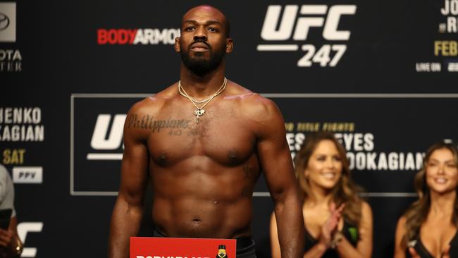 Jon Jones on the scales for his last UFC fight in February 2020. (Photo by Ronald Martinez/Getty Images)