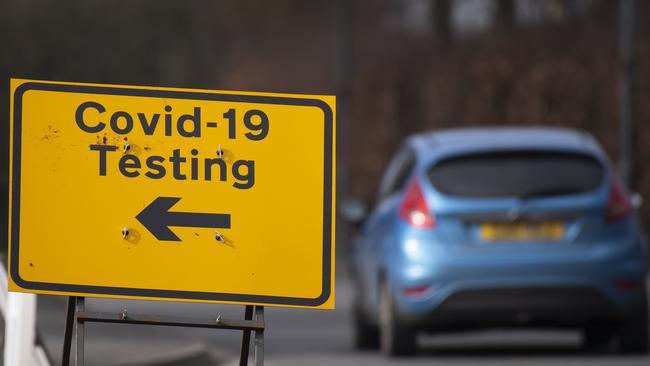 A COVID-19 testing sign in Bristol, England. Picture: Getty Images.