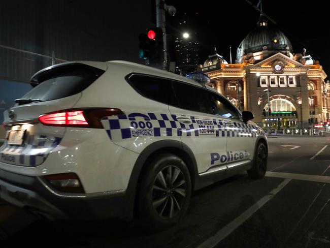 Victorian police on curfew patrol in Melbourne. Picture: Getty Images.