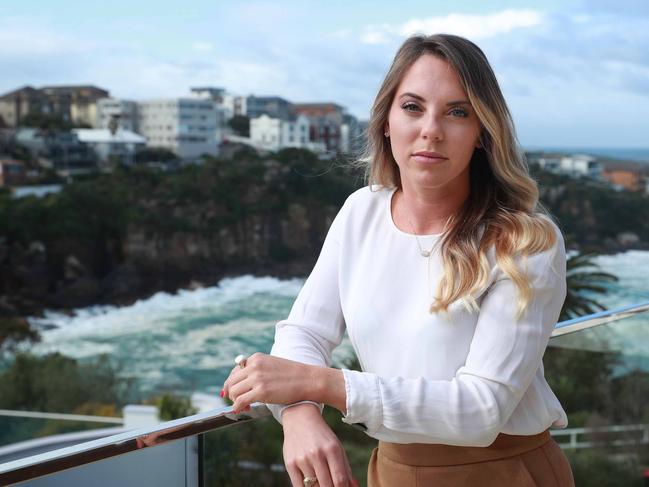 15/7/20: Caitlin Smith is one of the hidden victims of the Virgin Australia administration. Forced to cancel a holiday in April due to COVID-19 she is still waiting for a refund - with the only other option to use a travel credit to book and fly before August 15. Pictured at home in Coogee. John Feder/The Australian.