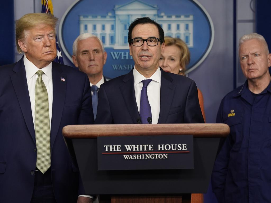 Treasury Secretary Steven Mnuchin speaks during a press briefing as US President Donald Trump looks on. Picture: AP