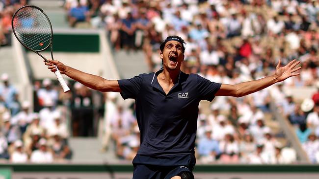 Lorenzo Sonego of Italy celebrates after winning match point. (Photo by Clive Brunskill/Getty Images)