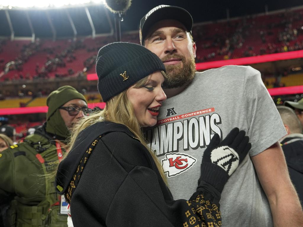 Kansas City Chiefs tight end Travis Kelce, right, is congratulated by Taylor Swift. Picture: AP Photo/Charlie Riedel