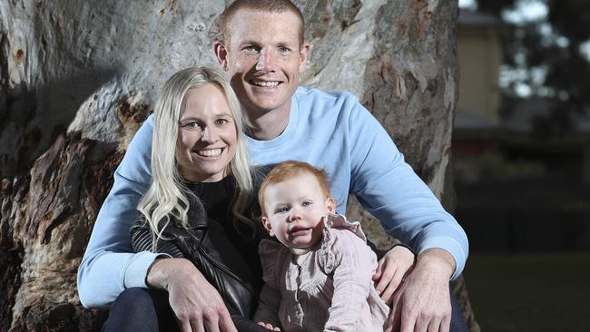 Adelaide’s Sam Jacobs with wife Izzy and daughter Imogen ahead of his 200th game on Saturday. Picture: SARAH REED