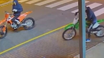 The alleged thieves riding away on the stolen motorcycles. Picture: 7 News