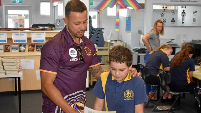 MAN TO MAN: Scott Prince sharing some off-field wisdom with Roma State College students in the Beyond the Broncos program. Picture: James Liveris