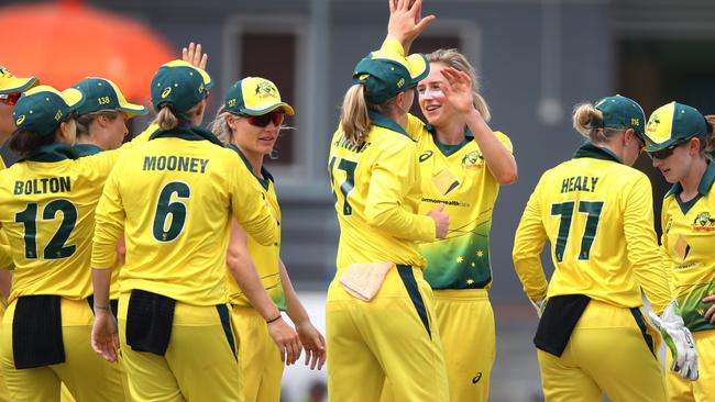 Ellyse Perry celebrates with her Australia teammates during the second ODI against Pakistan in Kuala Lumpur.