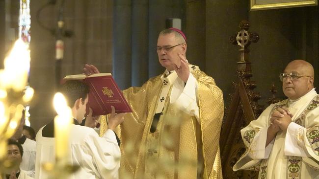 Archbishop Peter Comensoli at Easter Sunday Mass at St Patrick’s Cathedral in East Melbourne. Picture: NCA NewsWire / Valeriu Campan