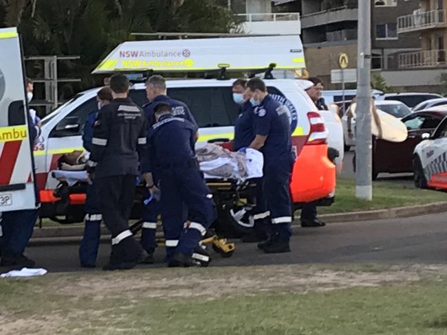 Emergency services assist Haruto Morishita at Dee Why Beach on Thursday, October 27. Picture: Manly Daily