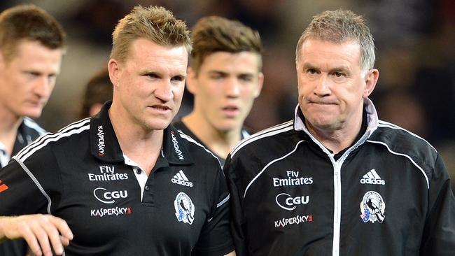 Collingwood coach Nathan Buckley with Geoff Walsh in 2012.