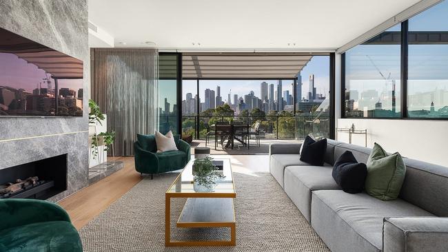 Premiership coach Paul Roos and wife Tami sold their luxe South Melbourne penthouse.