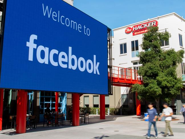 (FILES) In this file photo taken on October 23, 2019, a giant digital sign is seen at Facebook's corporate headquarters campus in Menlo Park, California. - Facebook reported July 30, 2020, that its quarterly profit had nearly doubled and users grew despite a boycott by advertisers. (Photo by Josh Edelson / AFP)