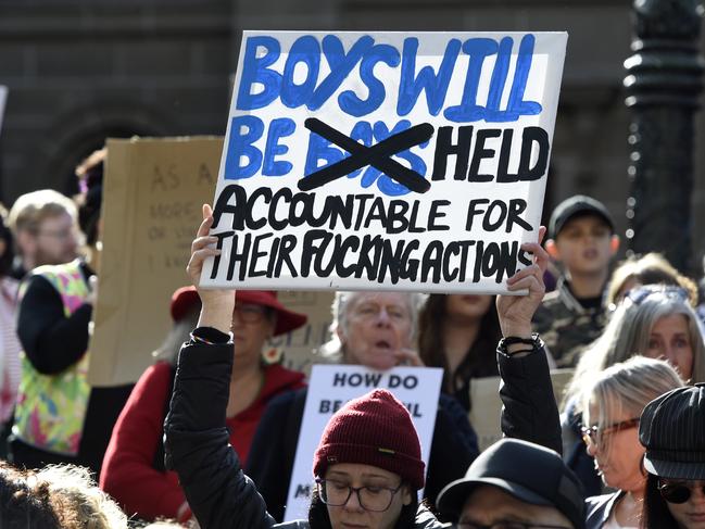 Thousands gather outside the State Library for the national rally against gender based violence. Picture: Andrew Henshaw