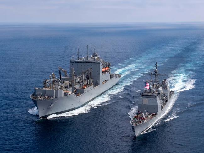 The USS Chosin, a guided-missile cruiser, sails alongside the larger USNS Washington Chambers, during testing of a new method of resupplying ships at sea. Photo: U.S. Navy