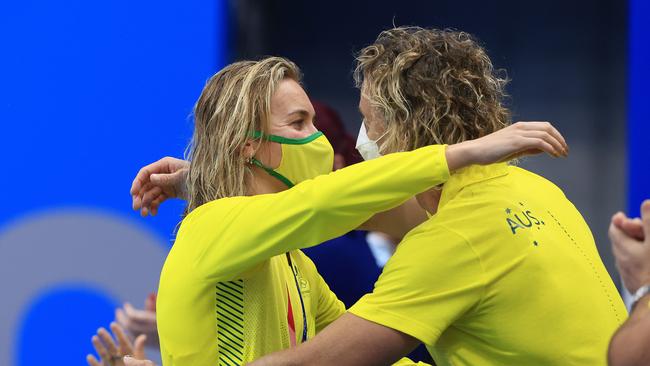 Titmus hugs her coach Dean Boxall after winning the Women's 400m Freestyle final. Picture: Adam Head.