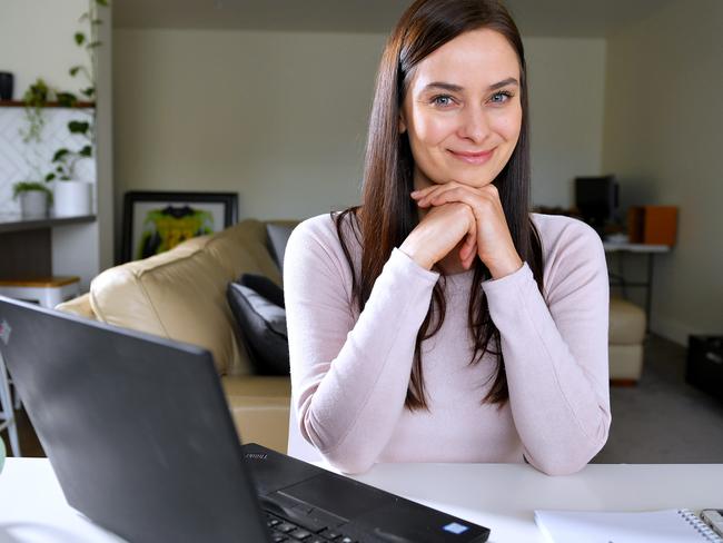 Jesse Roberts checks her shares online at her West Home in Adelaide Monday August 24,2020.Picture Mark Brake