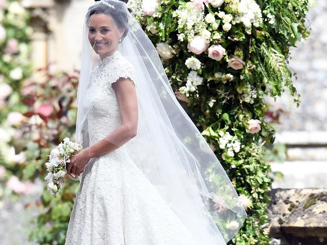 AVAILABLE FOR GROUP WEB AND PRINT - ENGLEFIELD GREEN, ENGLAND - MAY 20:  Pippa Middleton arrives at the wedding of Pippa Middleton and James Matthews at St Mark's Church on May 20, 2017 in Englefield Green, England.  Picture: Samir Hussein/Samir Hussein/WireImage/Getty Images