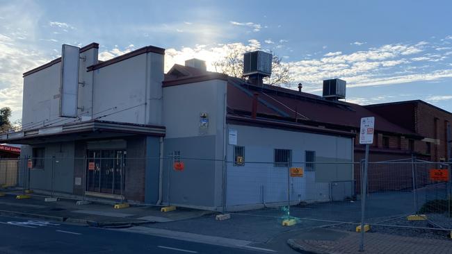 Temporary fencing has been erected around the vacant Windsor Theatre at Lockleys, which is scheduled to be demolished within days. Picture: Rachel Moore