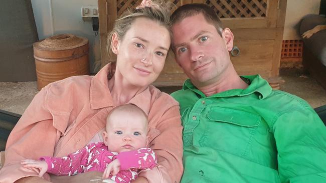 Lilly Castor with her husband and daughter Trixie at home. Mrs Castor said the program would help other mothers to cope with stillbirth. Pictures: Contributed