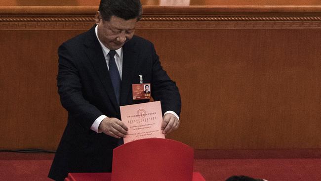 Xi votes to abolish presidential term limits in 2018, paving the way for himself to rule indefinitely.