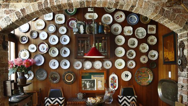 Kitchen eatery features collected French plates on the wall. Picture: John Appleyard