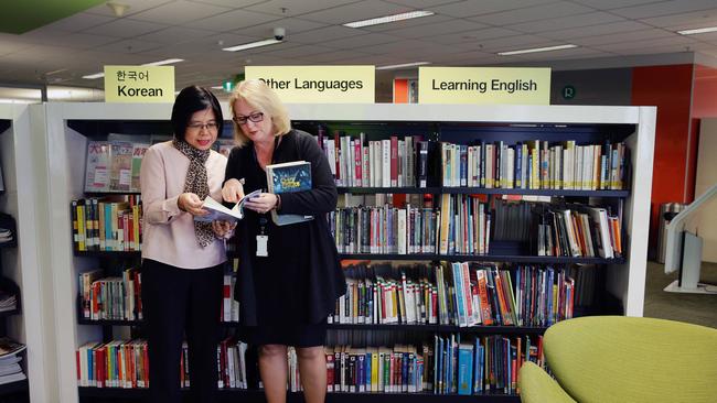 Stella Tay with Senior Librarian Kathleen Allen.