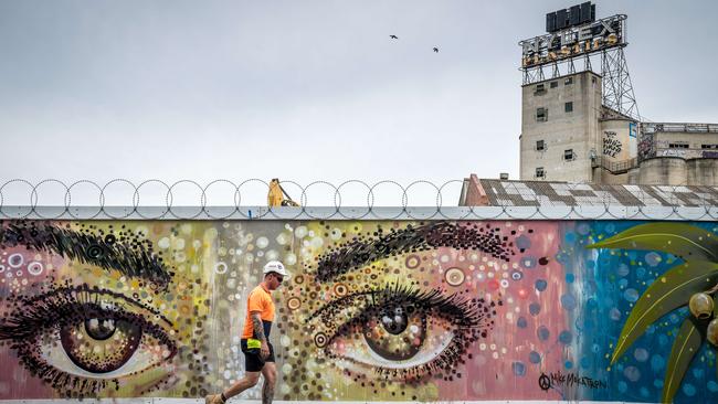 Mike Maka’s mural at the Nylex clock construction site in Cremorne. Picture: Jake Nowakowski