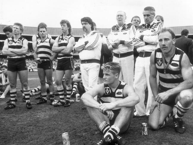 Shattered Cats players after the narrow 1989 grand final loss.