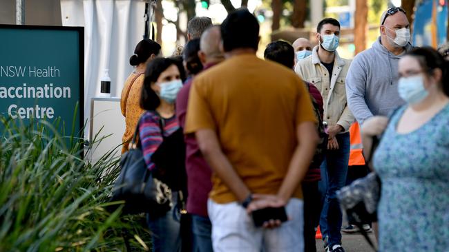 Sydneysiders line-up at the new COVID-19 Vaccination Centre at Sydney Olympic Park. Picture: NCA NewsWire / Jeremy Piper