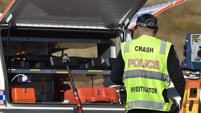 An investigator with the Queensland Police Forensic Crash Unit. File image. Picture: Kevin Farmer