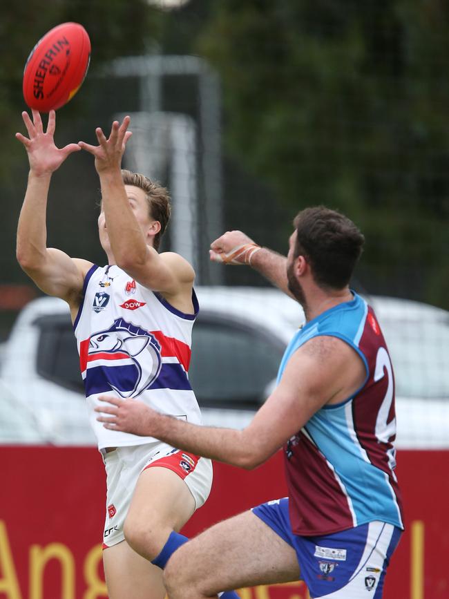 Football BFL: Modewarre v Queenscliff. Queenscliff 36 Riley Martin takes a leap for the ball over Modewarre 23 Zack May Picture: Mark Wilson