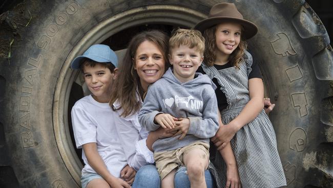 Gippsland Jersey co-founder Sallie Jones with her children, Billy, 10, Max, 7, and Evie, 8. Picture: Zoe Phillips