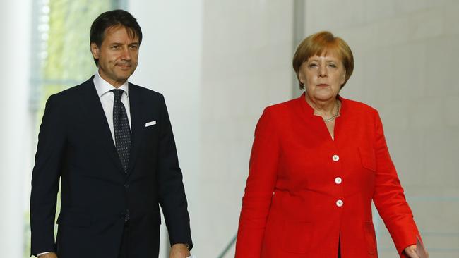 Italian Prime Minister Giuseppe Conte with German Chancellor Angela Merkel in Berlin on Monday. Picture: Getty Images