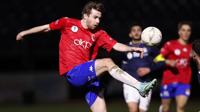 Ryan Brown controls the ball for FC Melbourne.