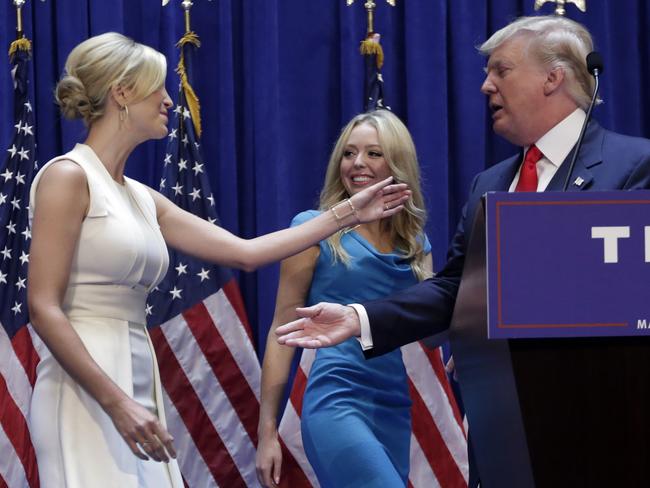 Family affair ... developer Donald Trump with daughters Ivanka Trump, left, and Tiffany Trump, after his announcement that he will seek the Republican nomination for president. Picture: AP/Richard Drew