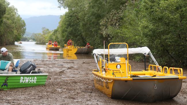 SES boats muster at the end of Wisteria St in Holloways Beach. Picture: Peter Carruthers