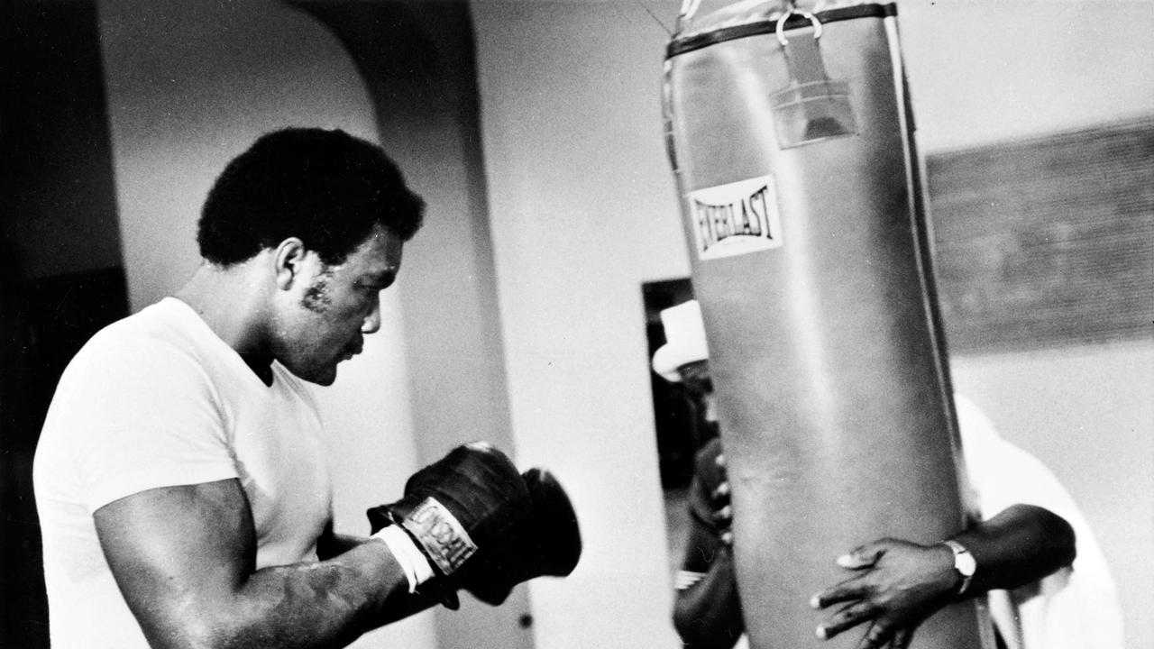 US Heavyweight boxer George Foreman is seen on January 1973 during a training session in preparation for his match against Joe Frazier in Kingston. Picture: AFP