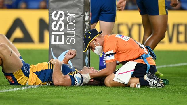 Keegan Hipgrave receives treatment for a head knock.